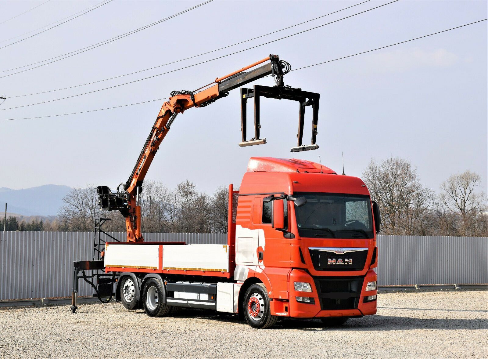 MAN TGX 26.440 kamion s ravnom platformom